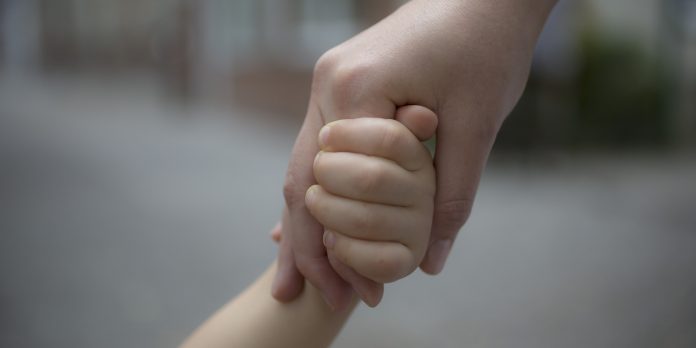 Close-up Of Two Hands